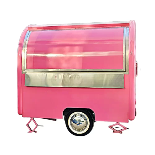 Discover the perfect Food Truck for Sale in the USA - the Best Sweet Pink Food Trailer with Italian Retro Charm. Our versatile food truck offers Taco, Hot Dog, Tamales, Coffee, Ice Cream and more. Equipped with 3 sinks, a fryer, and a rain protection system, it's a complete mobile kitchen. Explore this unique opportunity now from Trailer Concept